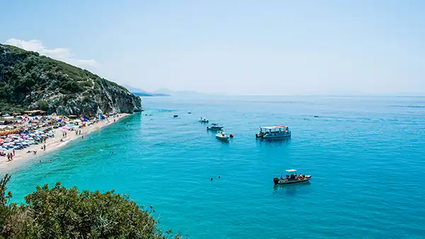 Gjipe Beach and canyon beside turquoise water on the Albanian Riviera